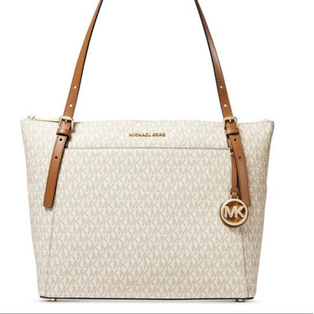 MK Voyager EastWest Vanilla tote Excellent cond.